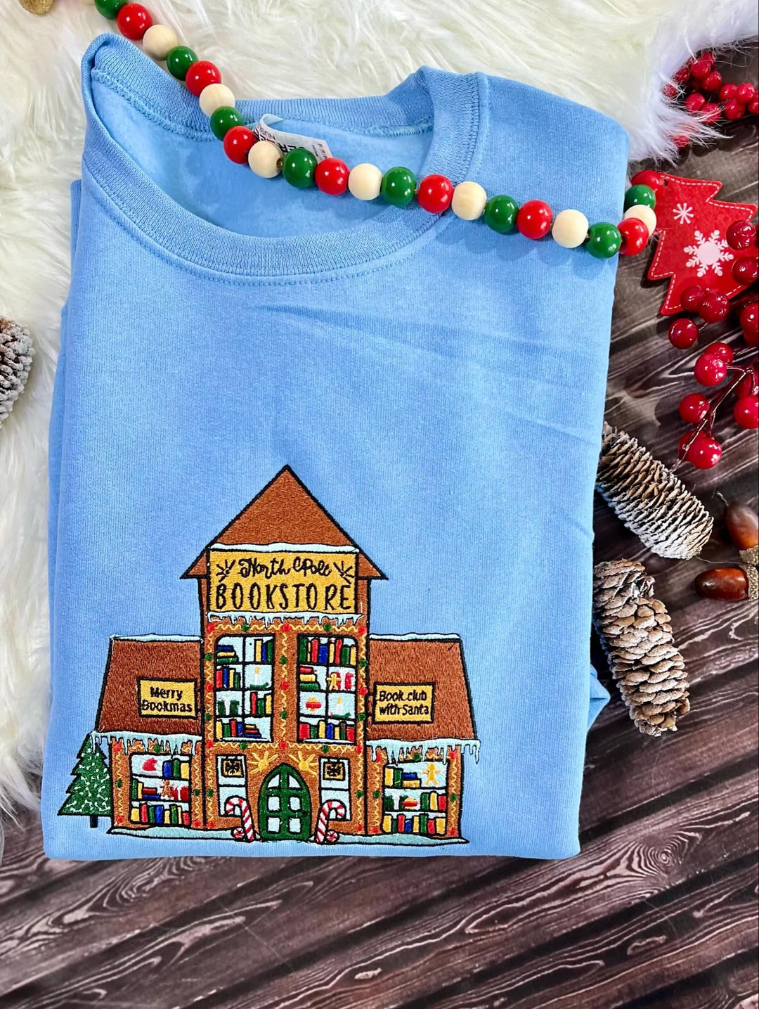 North Pole Bookstore Embroidered Sweater
